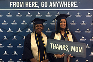 Marie Grimes and daughter Latonia Darien-Grundy at TCC's Commencement exercises