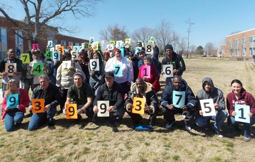 Students also lined up in order in the quad, each holding a number to signify the next value of pi.