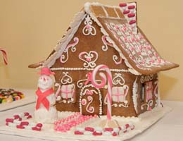Pink and white gingerbread house