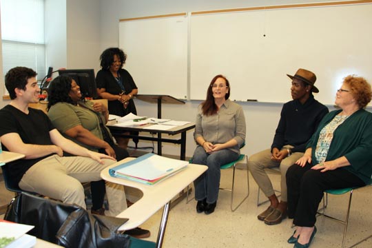 Human Services students Samuel Melchione, Shinisa Thomas, Christina Byrd, Justin Fleming, and Pamela Nobles role play a counseling session focusing on interracial marriage.