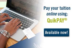 student paying tuition online