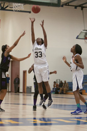 Lakendra Smith jumps for the rebound