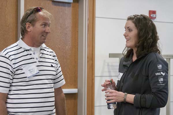 TCC Engineering alumna Rebekah Youngk talks with TCC student Mike Collins at a 2014 engineering panel.